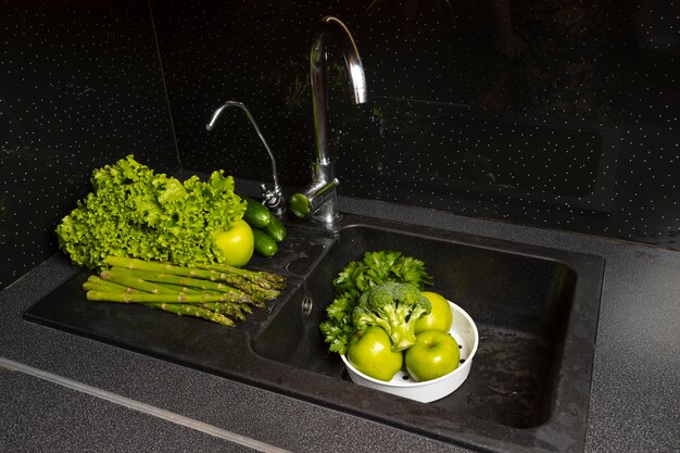 Assortment of healthy food being washed