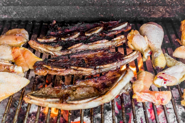 Free Photo assortment of meat grilled in barbecue