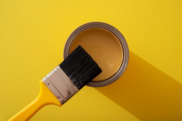 Assortment of painting items with yellow paint