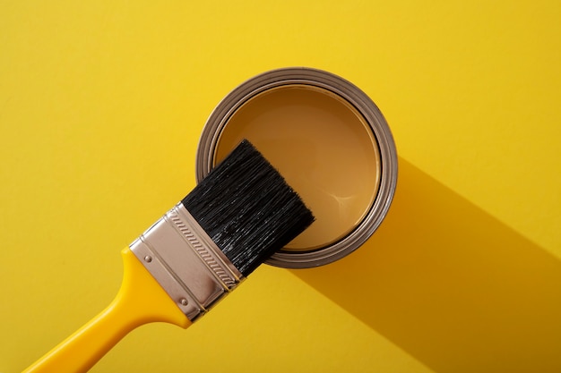 Assortment of painting items with yellow paint