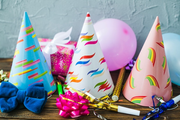 Assortment of party hats and balloons