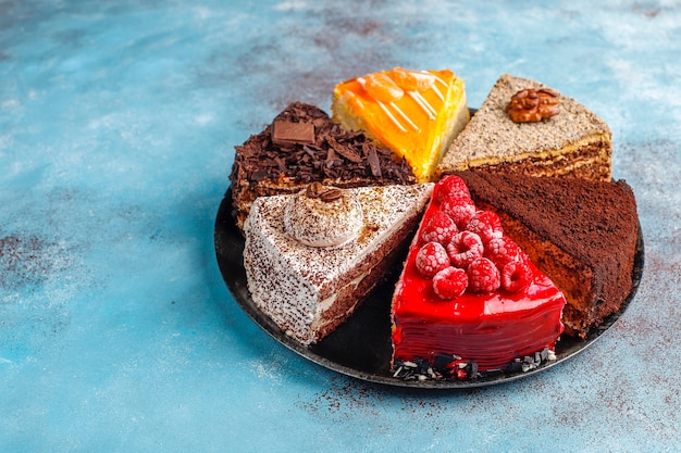 Assortment of pieces of cake.