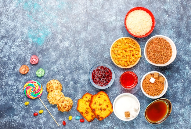 Free Photo assortment of simple carbohydrates food on light table