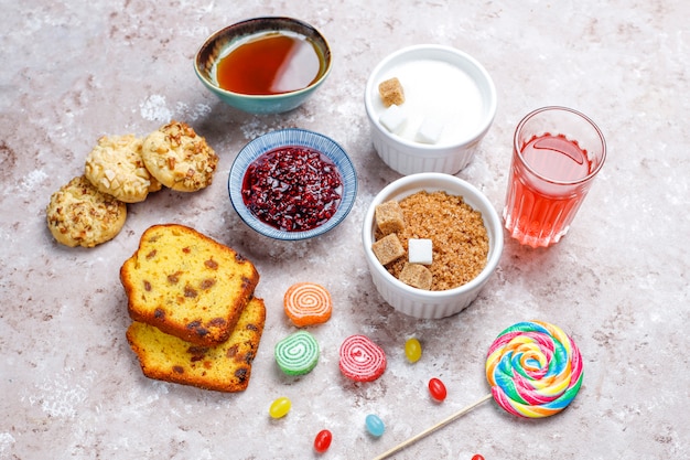 Assortment of simple carbohydrates food on light table