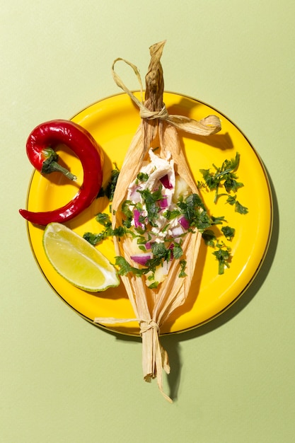 Free Photo assortment of tamales ingredients on a green table