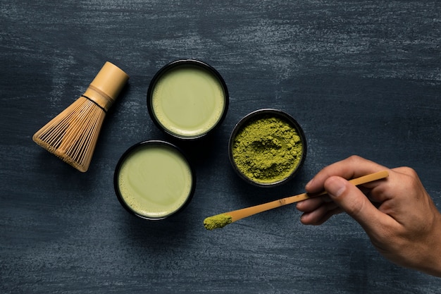 Free photo assortment of two matcha tea cups