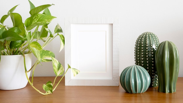 Assortment of white empty frame on table