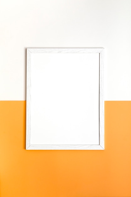 Assortment of white empty frame on wall