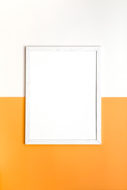 Assortment of white empty frame on wall