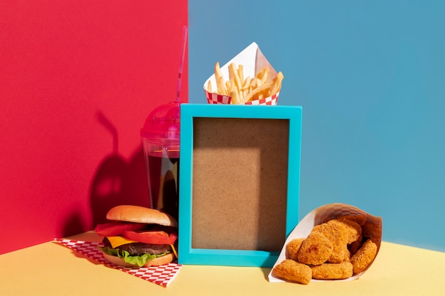 Free photo assortment with blue frame and delicious food