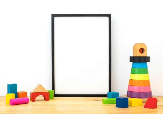 Assortment with empty frame in kid room