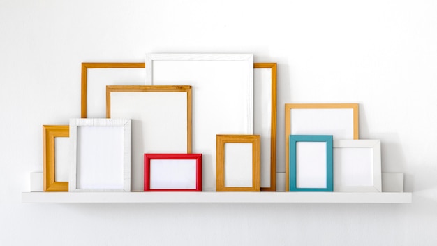 Assortment with empty frames indoors