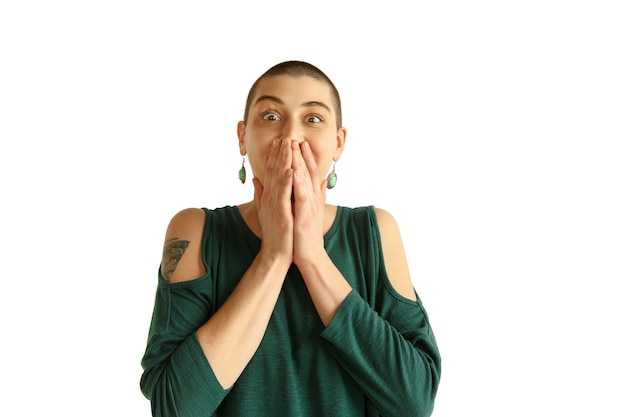 Astonished. Portrait of young caucasian woman with freaky appearance on white background.