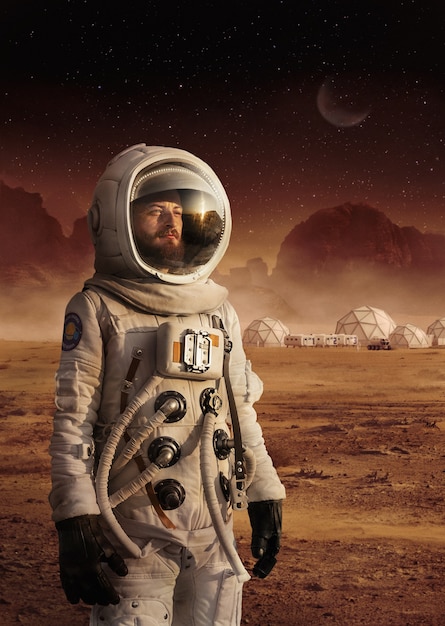 Astronaut with spacesuit on mars medium shot