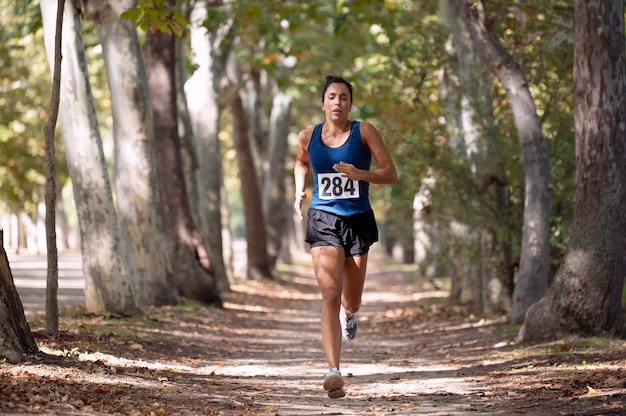 Athletic woman participating in a cross country