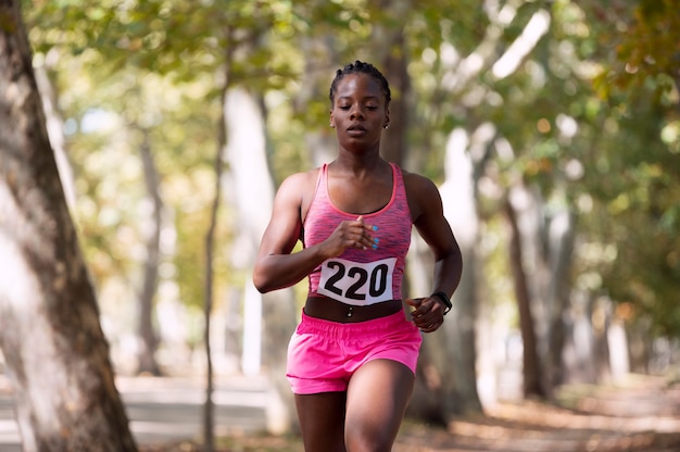 Athletic woman participating in a cross country