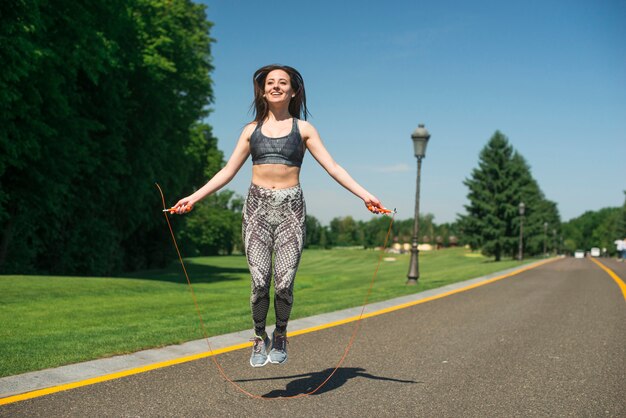 Athletic woman practicing sport outdoor