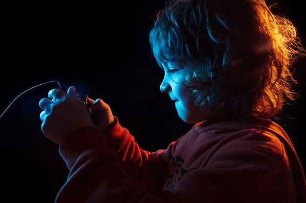 Attented boy playing videogames