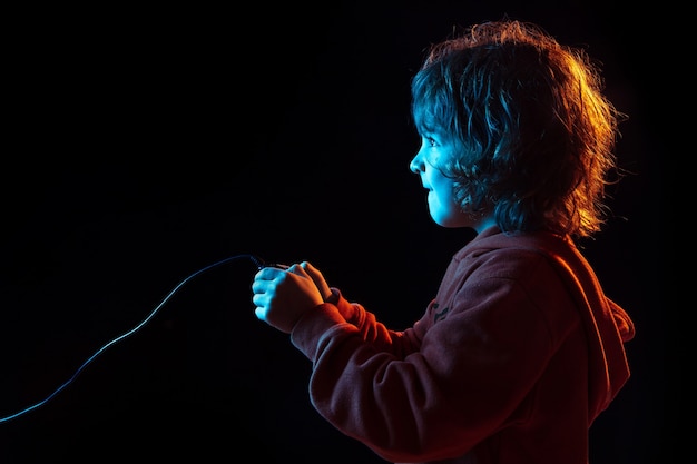 Attented boy playing videogames