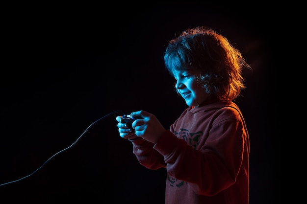 Attented boy playing videogames