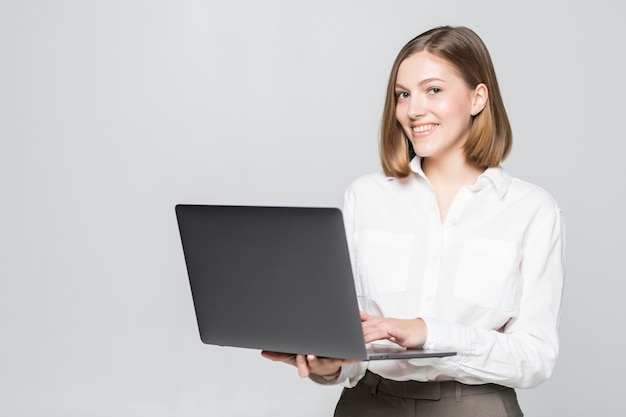 Attractive businesswoman with laptop