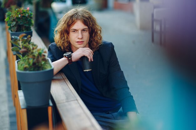 Attractive man drinking coffee