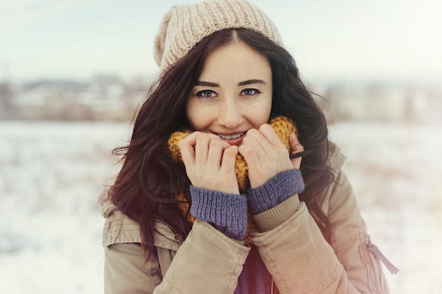 Attractive young woman in wintertime outdoor