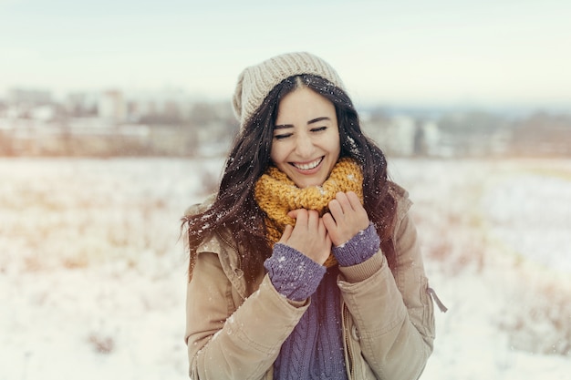 Attractive young woman in wintertime outdoor