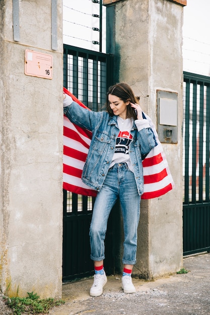 Attractive young woman with flag