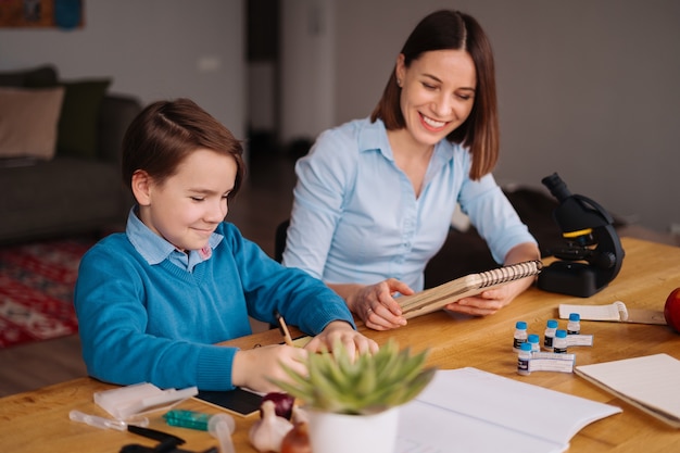 Aunt and nephew do homework together