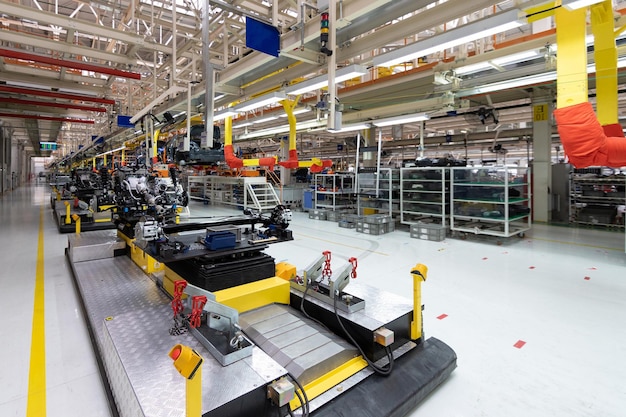 Free photo automated car assembly line plant of automotive industry shop for production and assembly of machines new car warehouse