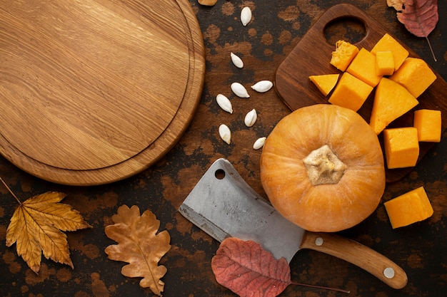 Free Photo autumn food pumpkin and empty wooden board