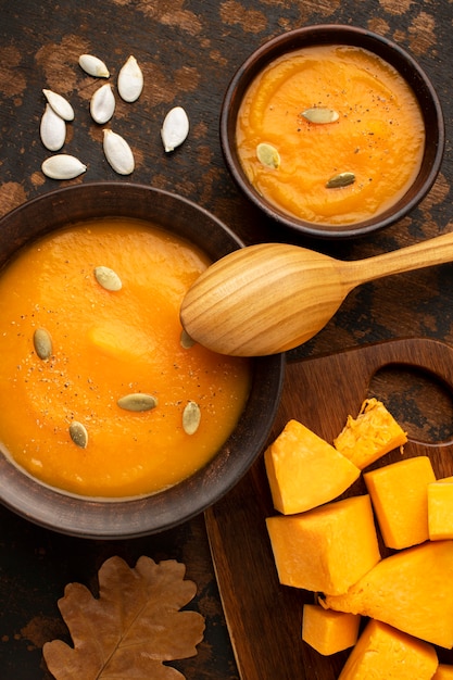 Autumn food soup and pieces of pumpkin