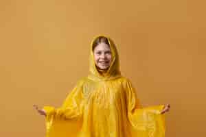 Free photo autumn person with rain coat