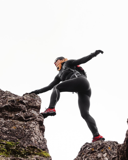 Free Photo autumn running outdoors workout jumping on the stones