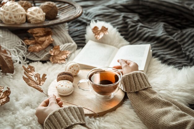 Autumn still life girl holding a Cup of tea.