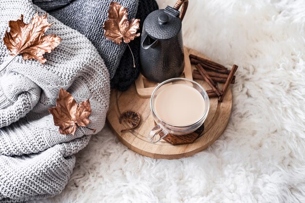 Autumn-winter Cozy home still Life with a Cup of hot drink.