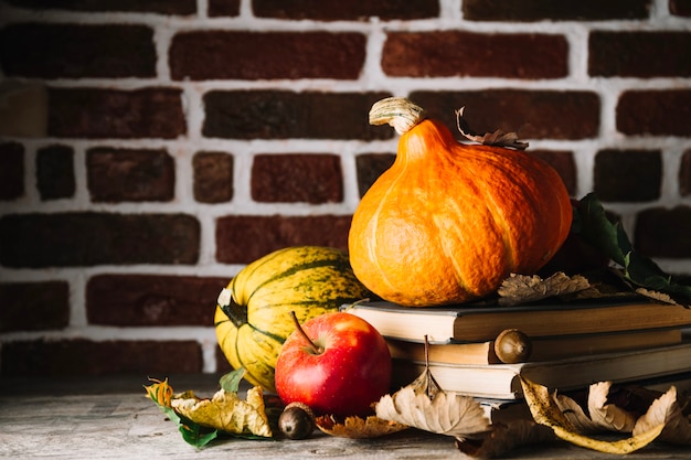 Free Photo autumnal arrangement with books