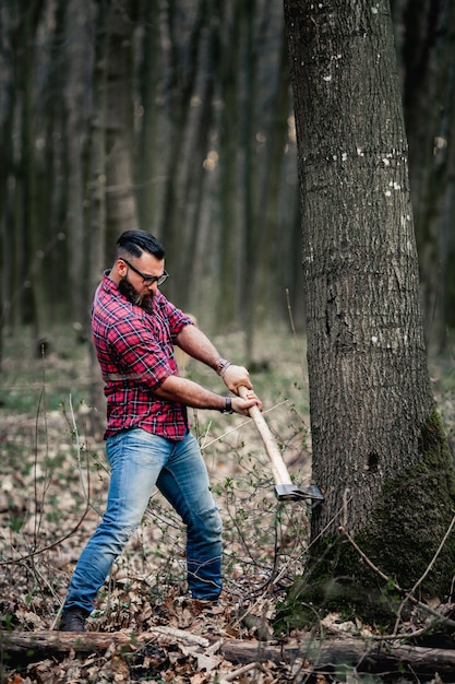 Free Photo axe man lumberjack bearded beard hipster