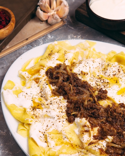 Azerbaijani Guru Khingal - Caucasian pasta with fried chopped meat. 