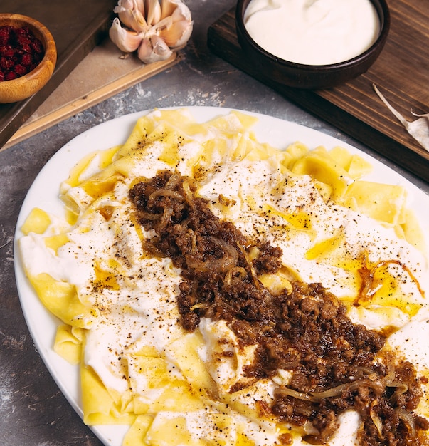 Azerbaijani Guru Khingal - Caucasian pasta with fried chopped meat.