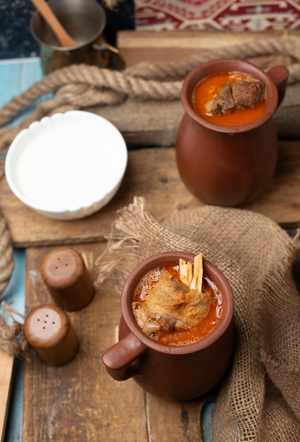 Azerbaijani meat stew piti with yogurt.