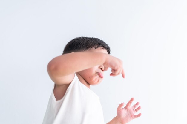 Baby boy in white tshirt over white background