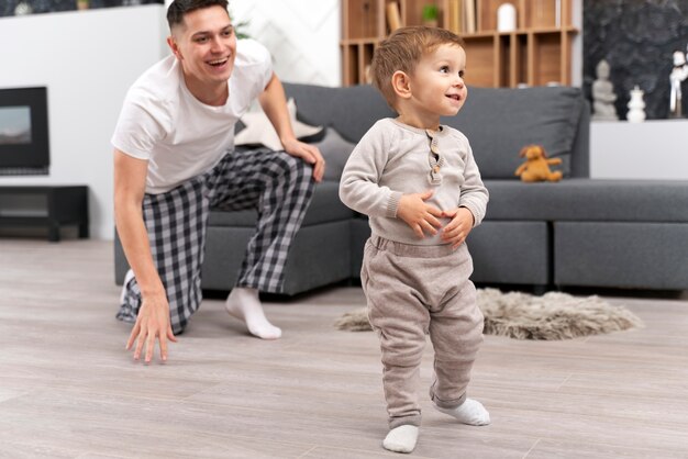 Baby doing his first steps