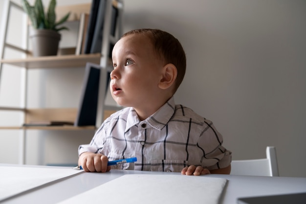 Baby dressed up as business person