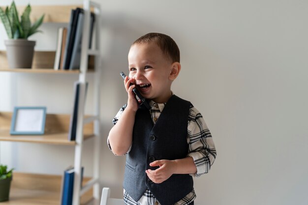 Baby dressed up as business person