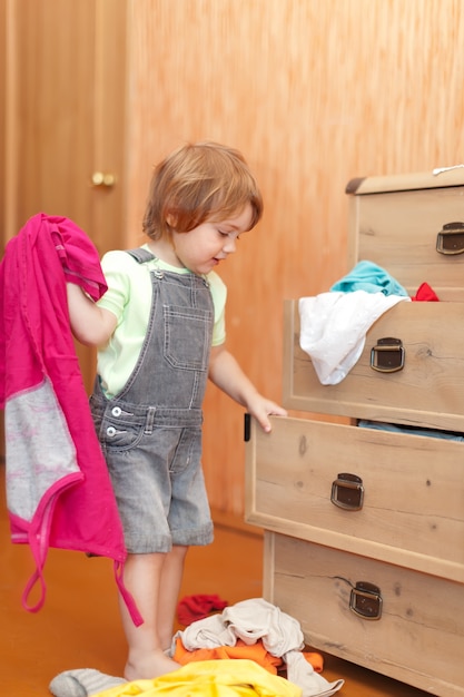 Free photo baby girl  chooses dress