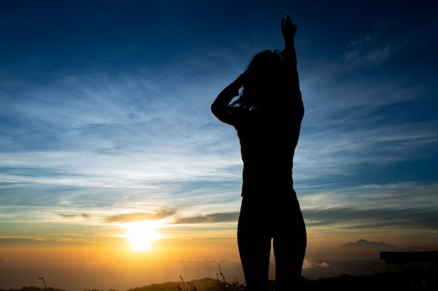 Free photo back light. girl silhouette. bali. indonisya