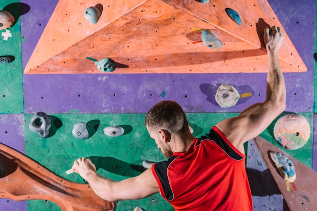 Free Photo back view climber on wall