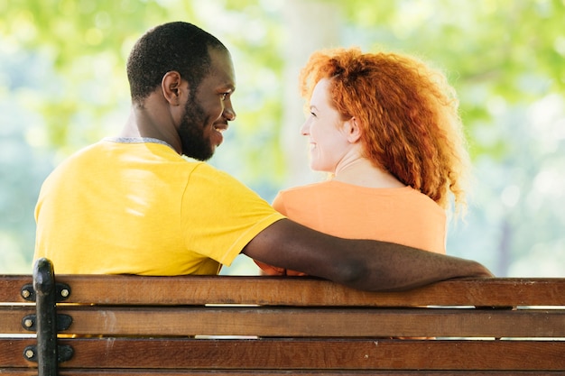 Back view of couple looking at each other